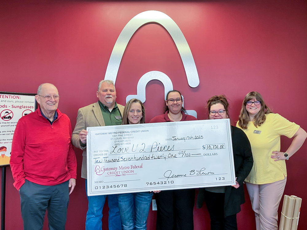 GMFCU team presenting donation check to Love U 2 Pieces charity at St. Louis branch