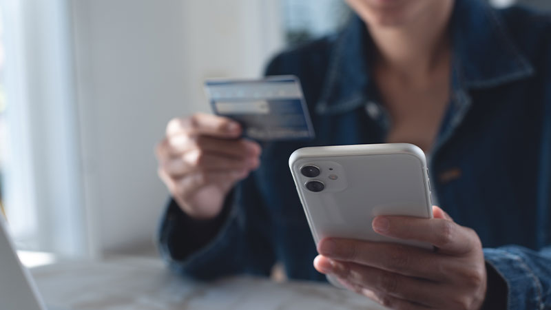 AdobeStock_464655102 Member using Gateway Metro FCU mobile banking app in St. Louis